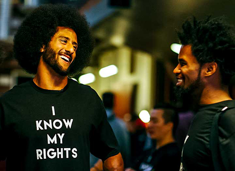 Colin Kaepernick speaks with teens in 2016 during an event to educate them about their rights especially when dealing with the police.