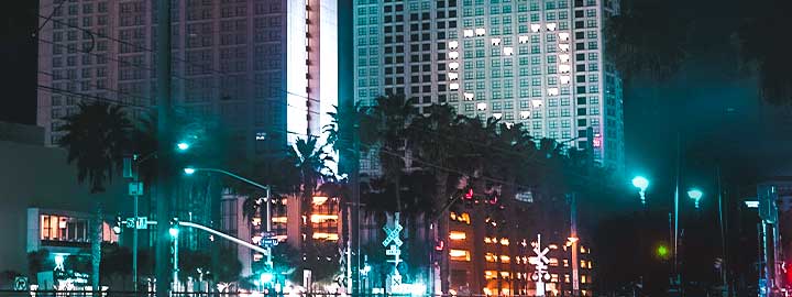 A photo of the pattern of a heart created by lights on the side of a tall hotel at night in San Diego, California in 2020 to show support for healthcare workers.