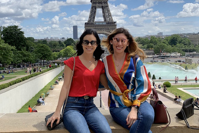 Two women in front of the Eiffel Tower 