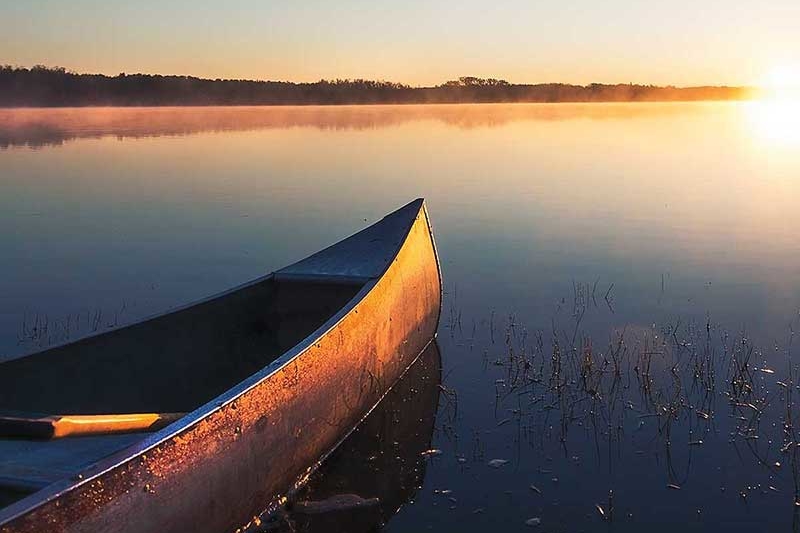 canoe at sunset