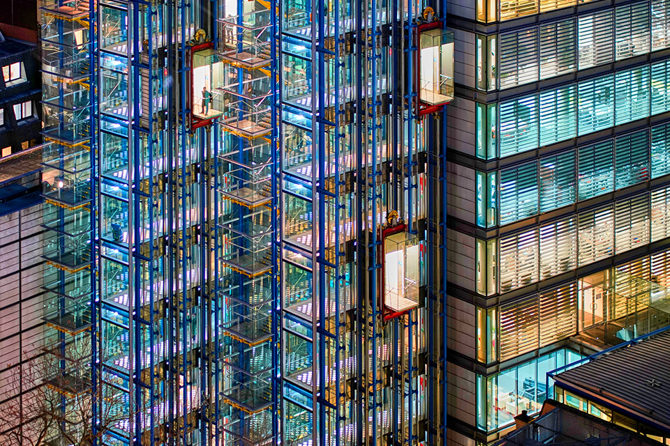 Glass elevators on the side of a London office building