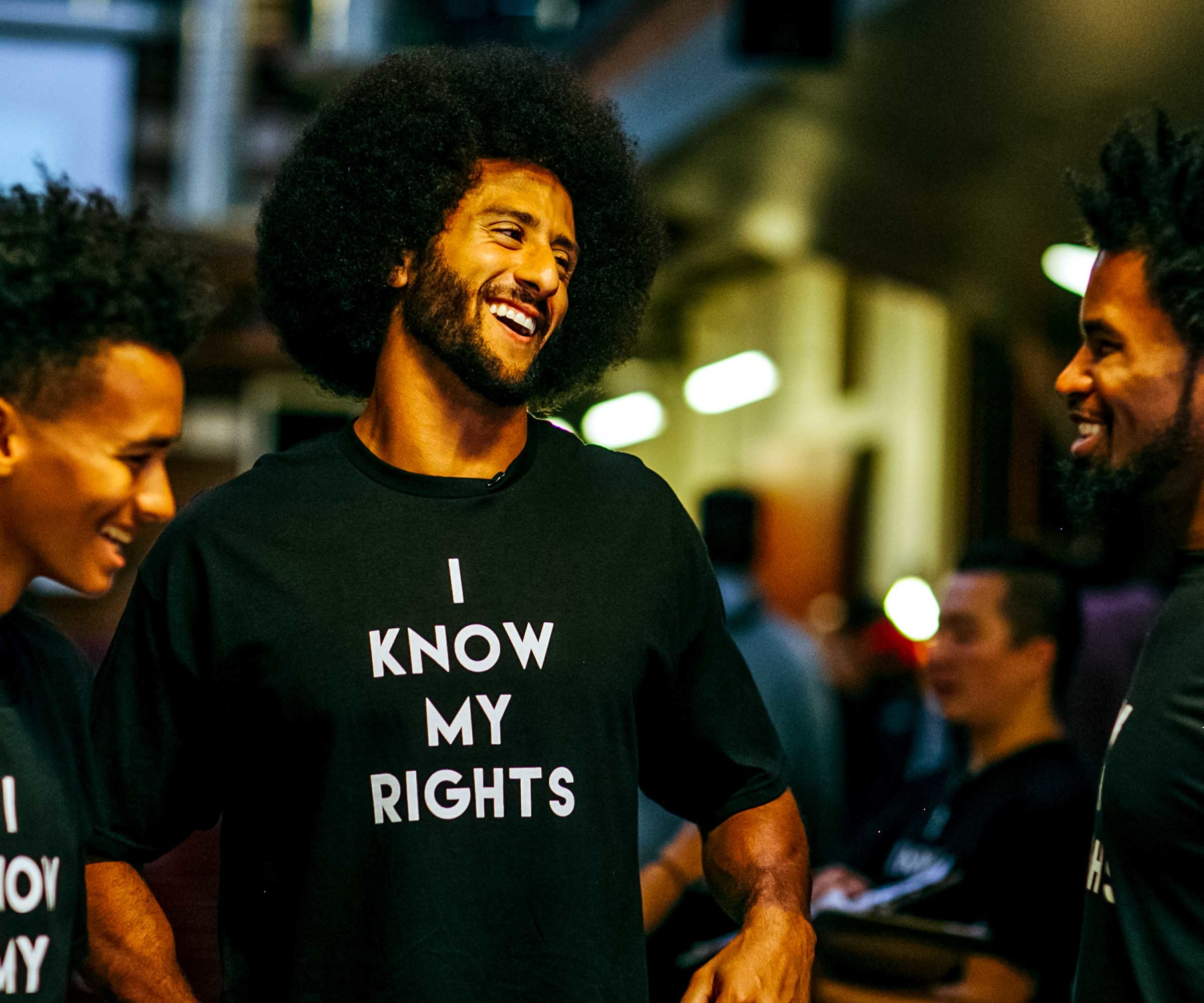 Activist and former NFL quarterback Colin Kaepernick appears at an Oakland, CA event held to educate youth about their rights. © Katrina Britney Davis